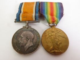 TWO WORLD WAR I SERVICE MEDALS AWARDED TO 41571 PTE G. WHITTAKER, MANCHESTER REGIMENT, comprising