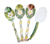 FOUR ASSORTED MAJOLICA SPOONS, by George Jones & Sons, three decorated with bramble blossoms, the