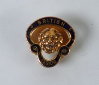 9ct GOLD AND ENAMELLED BRITISH LEGION LAPEL BADGE, embossed with a lion's head, Birmingham 1953,