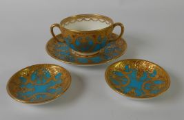 MINTONS FOR TIFFANY & CO, NEW YORK, A TURQUOISE GROUND CABINET CHOCOLATE CUP AND SAUCER with