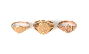THREE 9ct GOLD SIGNET RINGS, (one cut), 11.9gms
