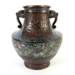 CHINESE QING DYNASTY BRONZE COLISONNE ENAMELLED TWO HANDLED VASE, the floriated enamel between