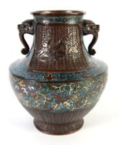 CHINESE QING DYNASTY BRONZE COLISONNE ENAMELLED TWO HANDLED VASE, the floriated enamel between