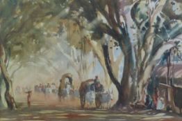 G.D. PAULRAJ (1914 - 1989) WATERCOLOUR DRAWING Indian street lined with banyan trees and busy with