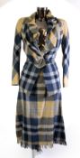 VIVIENNE WESTWOOD GOLD LABEL: Blue and yellow tartan skirt suit with ruffled jacket and long