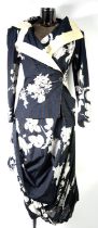 VIVIENNE WESTWOOD ANGLOMANIA: Blue Striped and flower print ensemble including mid length skirt,