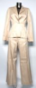 ITALIAN: Two italian suits; one a cream viscose trouser suit, and brown linin skirt suit, size S [2]