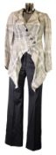 VIVIENNE WESTWOOD ANGLOMANIA: Tartan suit with cream and black plaid jacket with tapering hem,