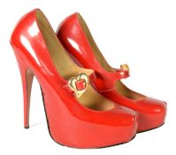 VIVIENNE WESTWOOD: Pair of cherry red ghillie platform 6" heals with heart-shaped clasp, size 6