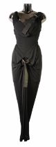 VIVIENNE WESTWOOD: Black figure hugging viscose bondage dress with buckled silk straps, size 10