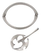 A 1960s H Hansen silver bangle 218 designed by Bent Gabrielsen and a silver pendant