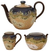 A Doulton Lambeth Slaters Patent stoneware three piece tea service