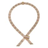 A 9ct three coloured yellow gold textured brick link necklace