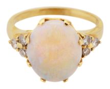 An opal and diamond-set ring