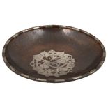 An Arts and Craft copper and pewter bowl by Hugh Wallis