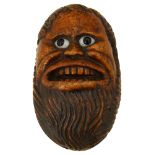 A 19th century treen burrwood snuff box carved as a bearded mans face