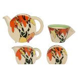 Four Clarice Cliff pieces decorated in 'Honolulu' design