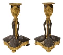 A pair of late Regency ormolu and patinated bronze candlesticks c.1835