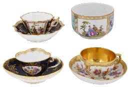 A Meissen cup and saucer, a KPM Berlin cup and saucer, a Dresden example and sugar basin