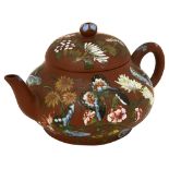 A Chinese miniature Yixing teapot and cover decorated in famille rose enamels