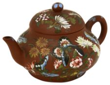 A Chinese miniature Yixing teapot and cover decorated in famille rose enamels