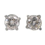 A pair of diamond ear studs