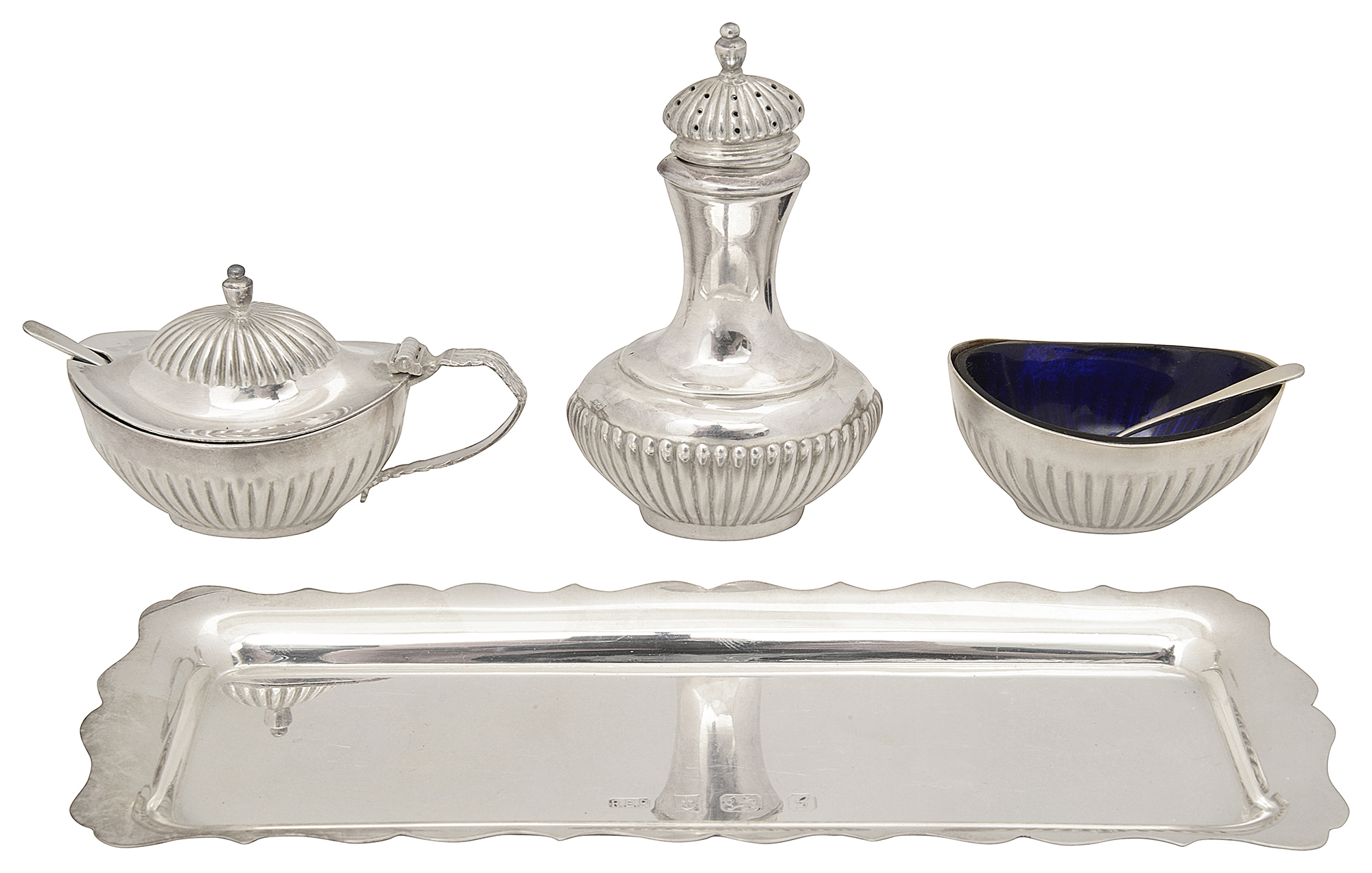 A modern silver three piece cruet set and tray