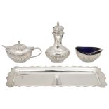 A modern silver three piece cruet set and tray