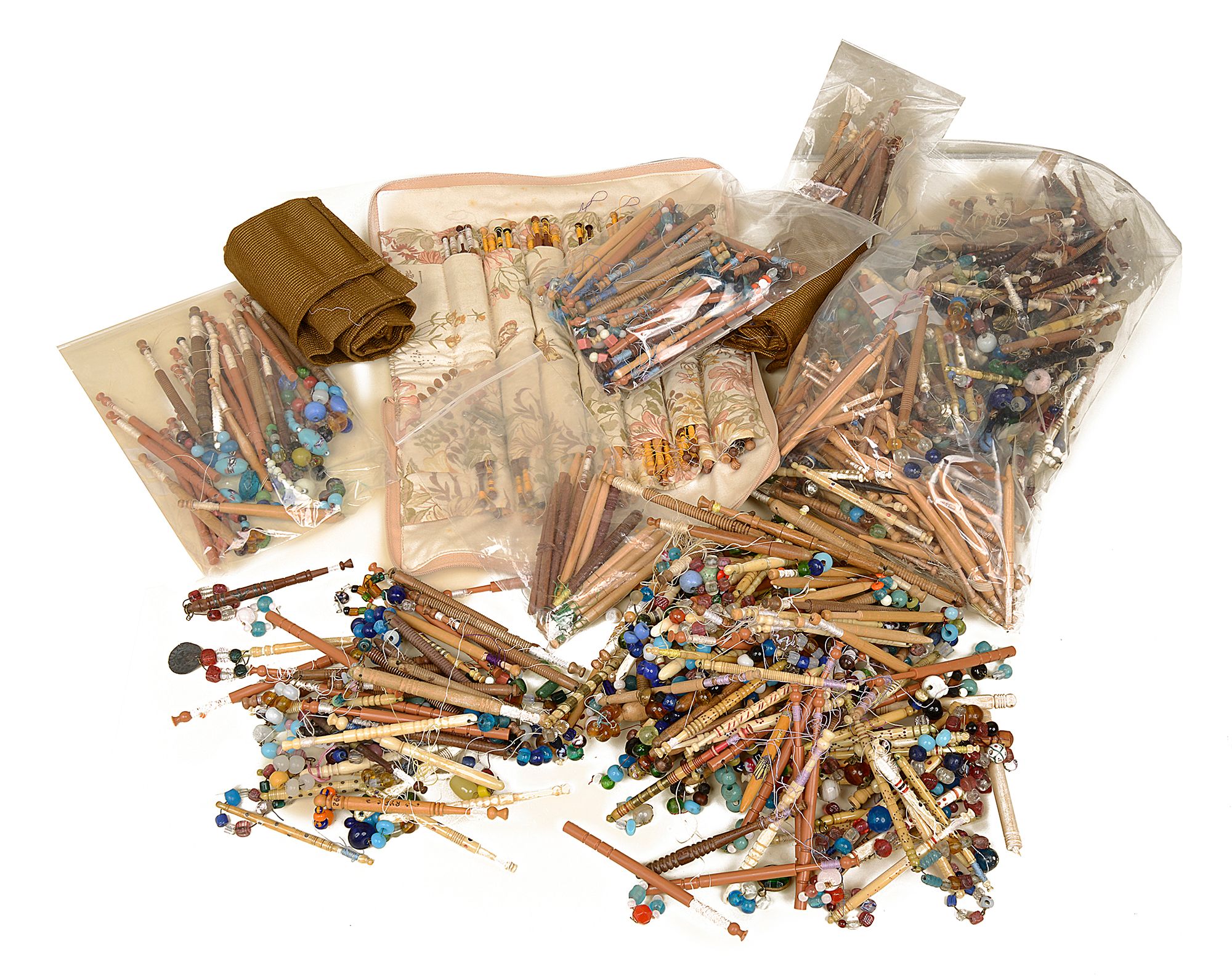 A large collection of lace bobbins