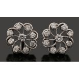 A pair of diamond-set cluster earrings