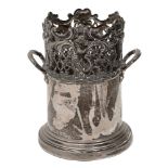 An Edwardian silver bottle stand