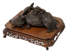 A Japanese Meiji period patinated bronze okimono group of five terrapins