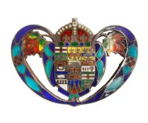 An early 20th century sterling silver and enamel pendant brooch