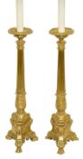 A pair of gilt brass altar candlestick lamps, Baroque style