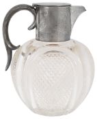 A late Victorian silver mounted presentation cut glass claret jug