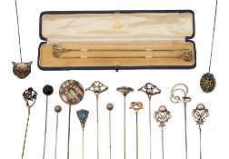 A collection of hat pins to include Art Nouveau Charles Horner examples