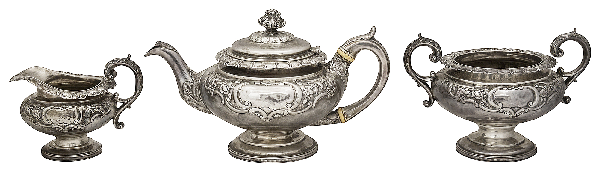 A Scottish George IV silver three piece pedestal tea service
