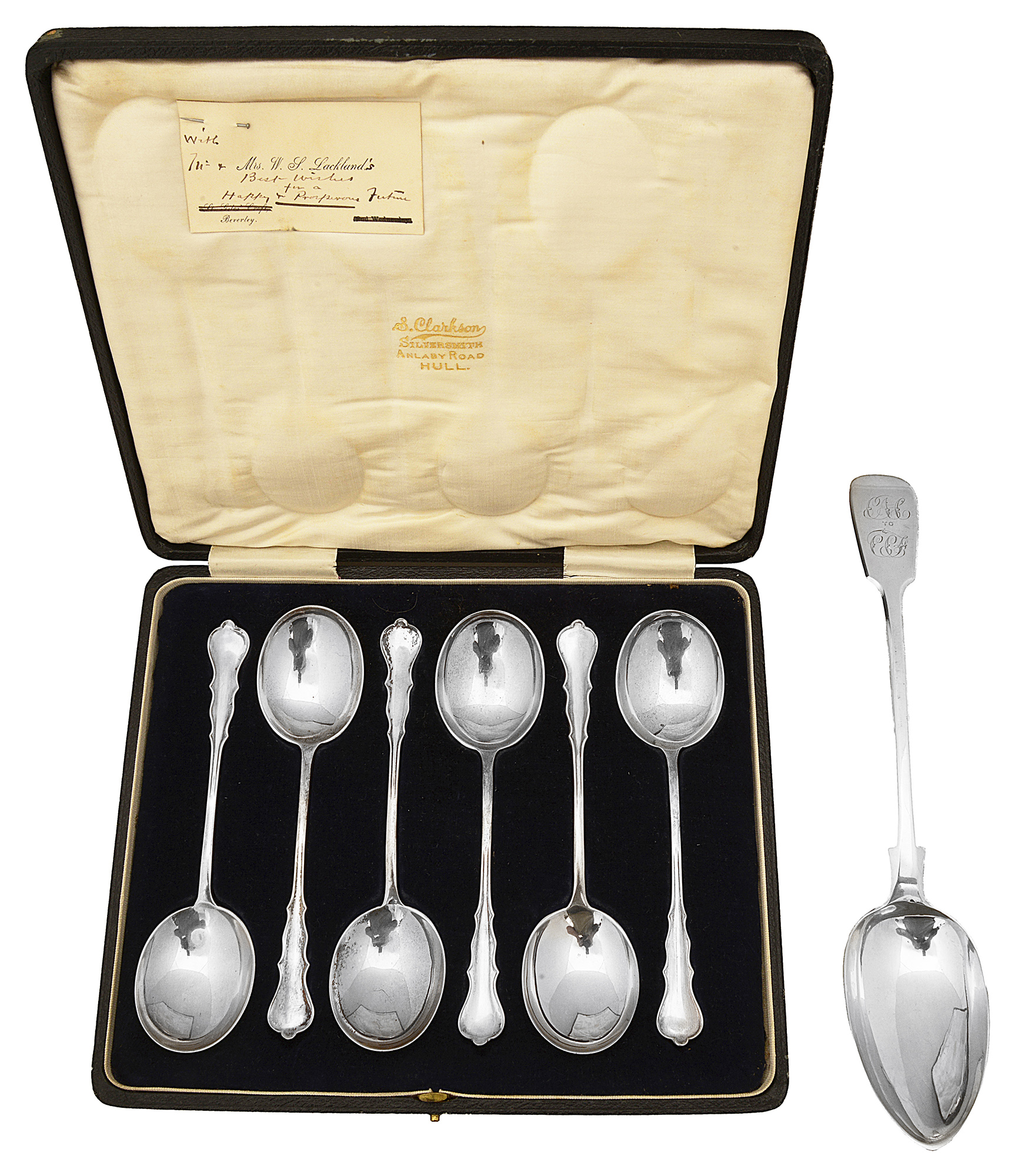 A George V cased set of six silver soup spoons and an early Victorian basting spoon