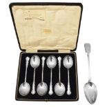 A George V cased set of six silver soup spoons and an early Victorian basting spoon