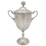 A late Victorian silver twin handled trophy cup and cover