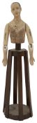 A continental Folk Art polychrome decorated wood Santos cage doll mannequin with articulated arms
