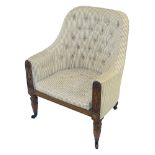 A George IV mahogany and upholstered tub library armchair
