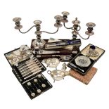 A collection of silver and electroplated items to include a pair of sauce boats, cased sets etc.