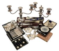 A collection of silver and electroplated items to include a pair of sauce boats, cased sets etc.