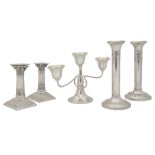Two pairs of Edwardian candlesticks and a George V candelabrum