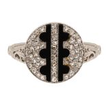 An onyx and diamond-set ring
