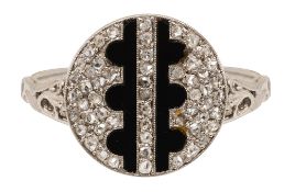 An onyx and diamond-set ring