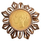 A Victorian gold mounted sovereign brooch