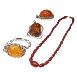 A group of amber jewellery