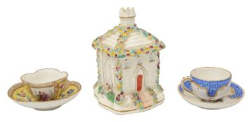 A 19th century Coalport pastille burner and two miniature Dresden cups and saucers